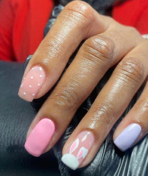 Pink and lavender Easter nails with bunny ears and polka dots