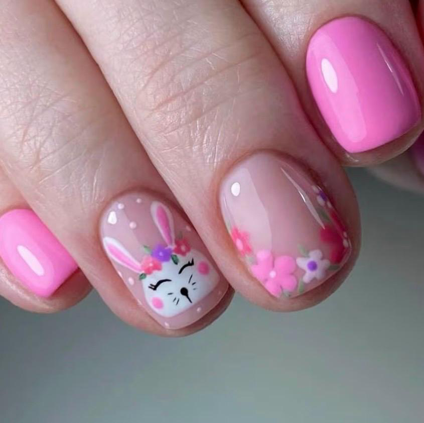 Pink spring nails with cute bunny and floral nail art