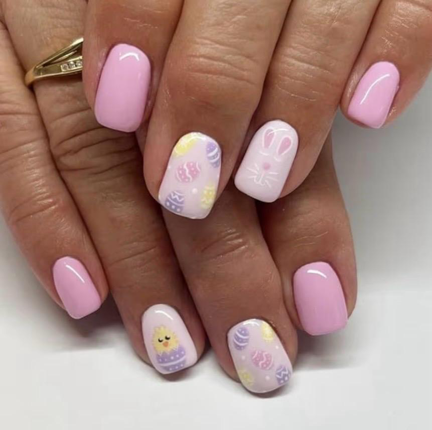 Pink nails with Easter bunny and egg designs